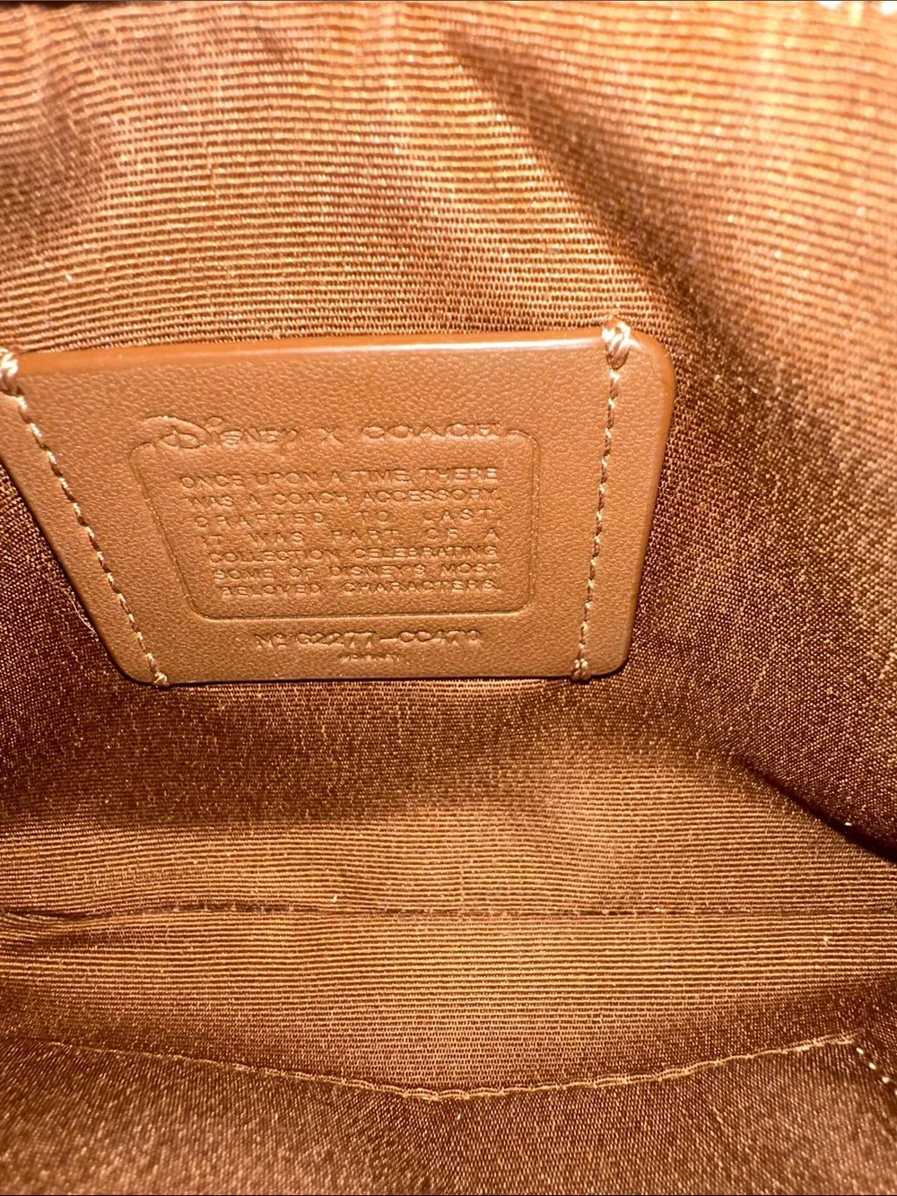 Coach Canvas Disney “Bad Girls Club”Wristlet in Brown with Purple Trim